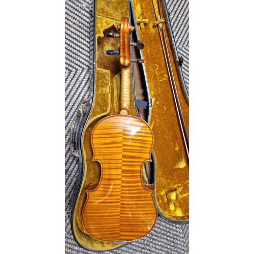 345 - Cased violin with a silver tipped W. E. Hill & Sons bow, violin approx 23