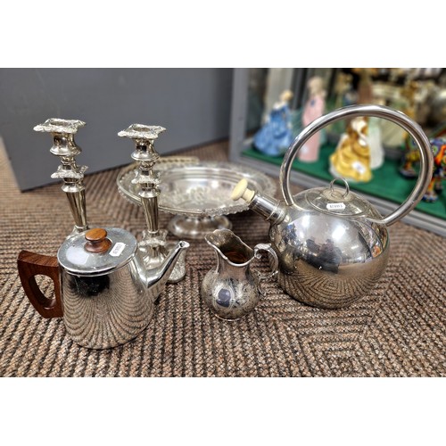 348 - Silver plated items to include teapots, ornate pair candlestick holders, milk jug, etc