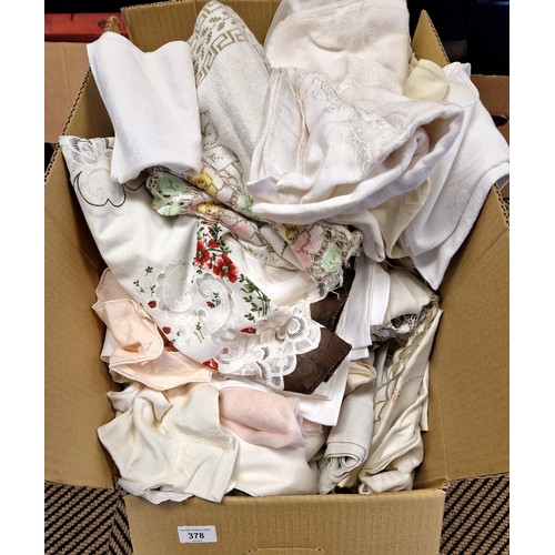 378 - Quantity of fabrics including linen, lace, etc