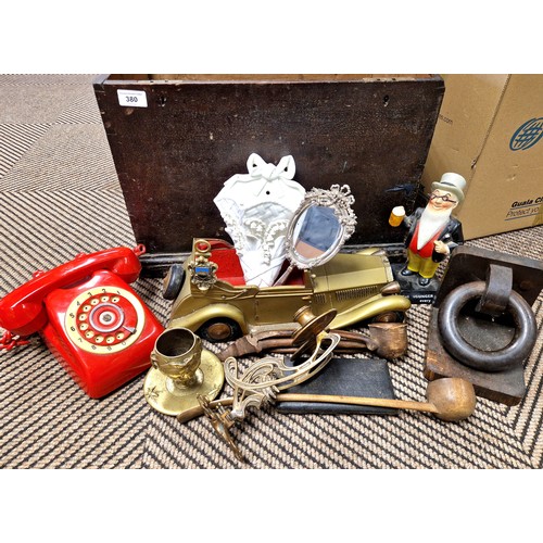 380 - Large chest containing model Rolls-Royce, retro telephone, jardiniere stands, assorted brass items, ... 