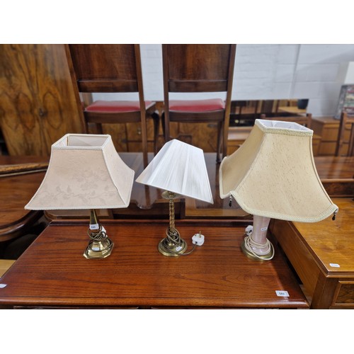 590 - Three assorted table lamps with shades