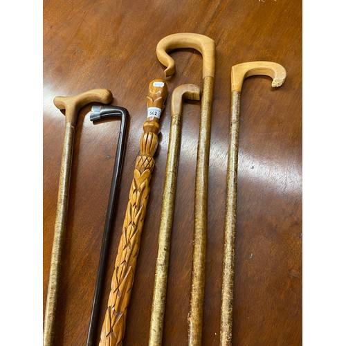 562 - Six assorted walking canes