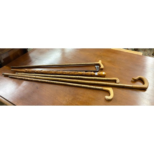 562 - Six assorted walking canes