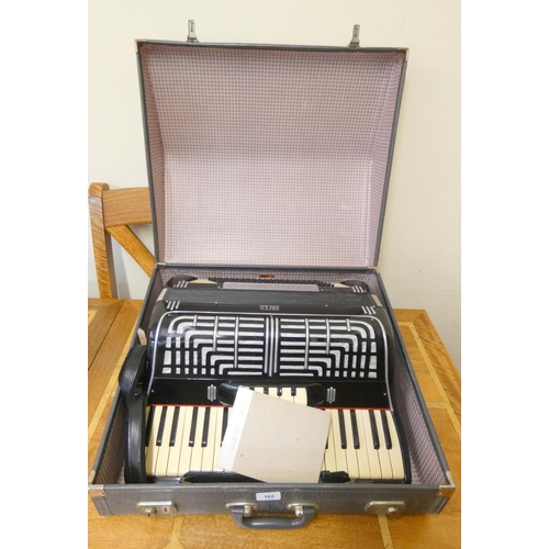 162 - An Italian Orfeo 120 accordion, in black finish and fitted leather case.