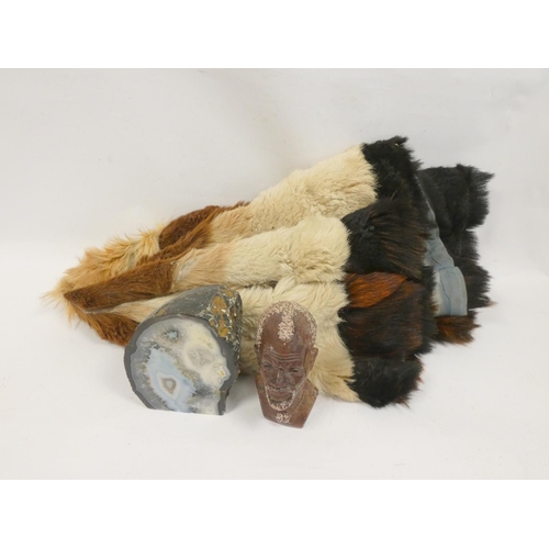 163 - African gazelle hide rug, a carved serpentine bust of a Maasai tribesman and a blue agate geode (3)