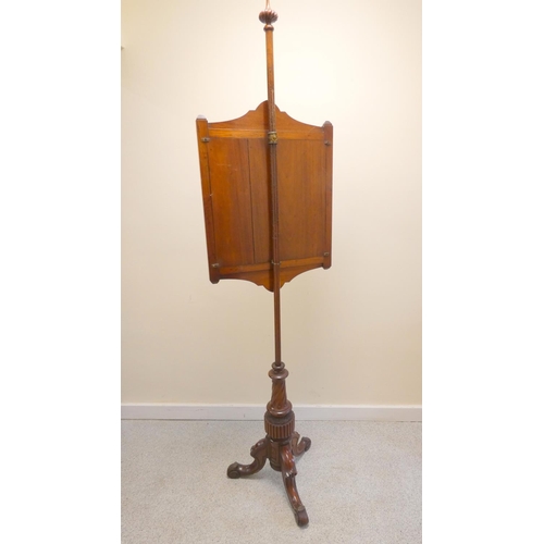 388 - 19th century mahogany fire screen with framed velvet floral panel, raised on scrolled tripod support... 