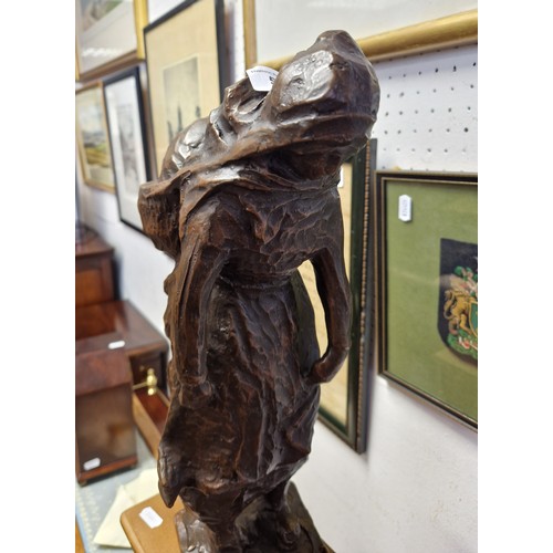 508 - Bronzed figure of a peasant woman, approx. 40cm high