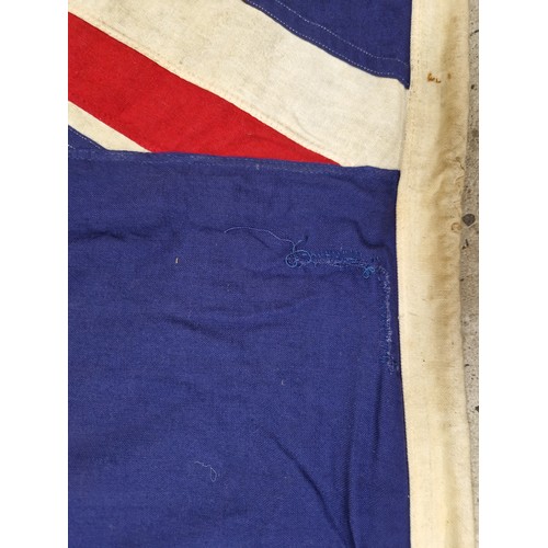 672 - Two vintage flags blue and red with union jack, red is 115cm x 170cm, blue is 100cm x 190cm