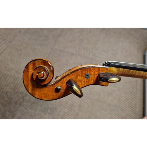 345 - Cased violin with a silver tipped W. E. Hill & Sons bow, violin approx 23