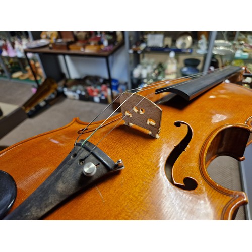 345 - Cased violin with a silver tipped W. E. Hill & Sons bow, violin approx 23