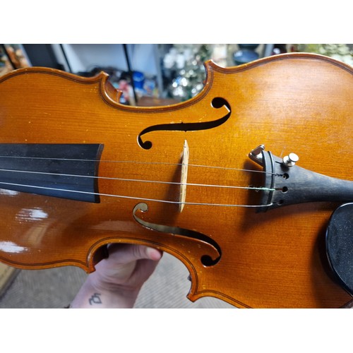 345 - Cased violin with a silver tipped W. E. Hill & Sons bow, violin approx 23