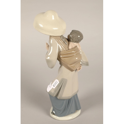 7 - Lladro Asian woman with child, 26cm h