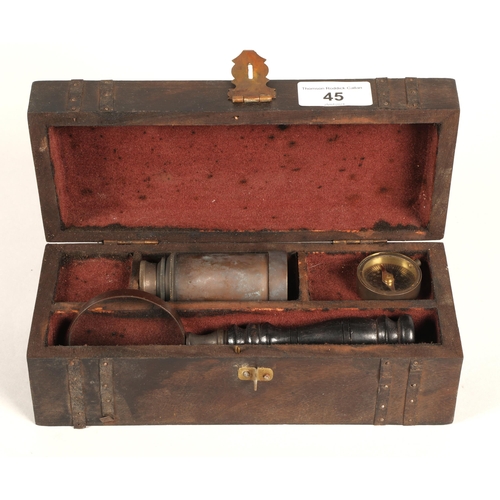 45 - Nautical tools in fitted case including eyeglass, magnifying glass, egg timer, and compass