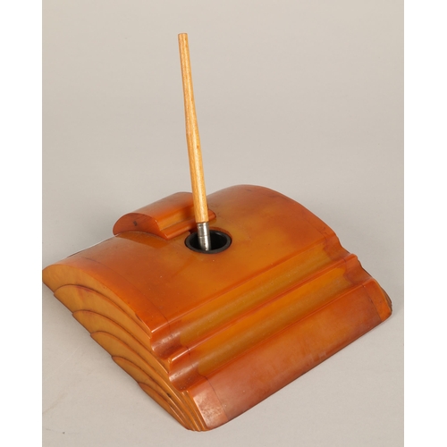 47 - Carvacraft, butterscotch amber coloured bakelite Art Deco ink stand with sliding inkwell lid