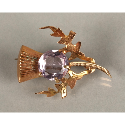 96 - Two 9ct gold brooches including a purple gem set thistle and a red gem set bow, and a mid century mo... 