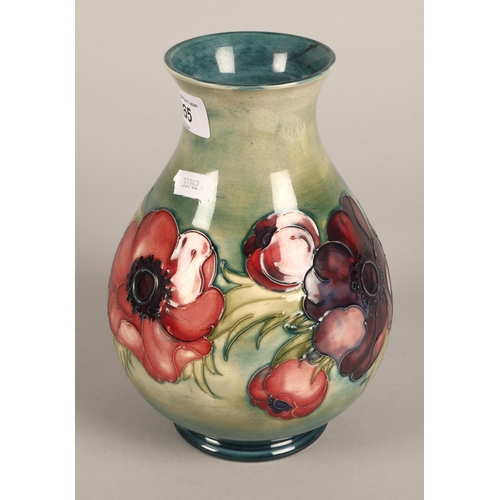 165 - Moorcroft poppy design vase, signed to base, 21cm h