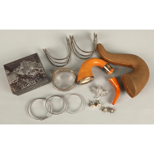 121 - Assorted items including silver bangles, vintage pipe in case (damaged), a white metal souvenir Clev... 