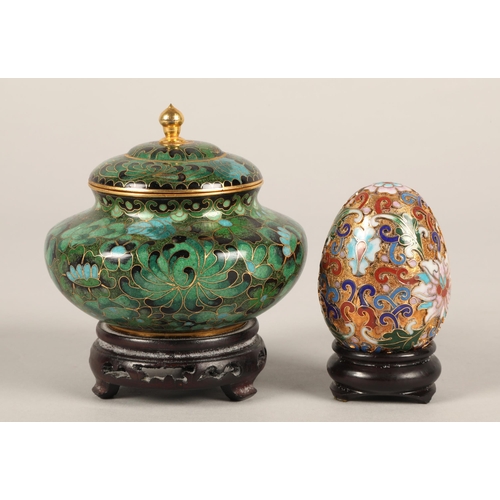 216 - Collection of cloisonne pieces including lidded pot on stand, egg, bird, and cased chopsticks