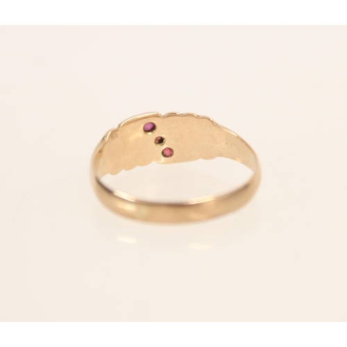 411 - Edwardian 9ct gold ring set with three round cut rubies and flanking seed pearls, size K/L, 1.9g.