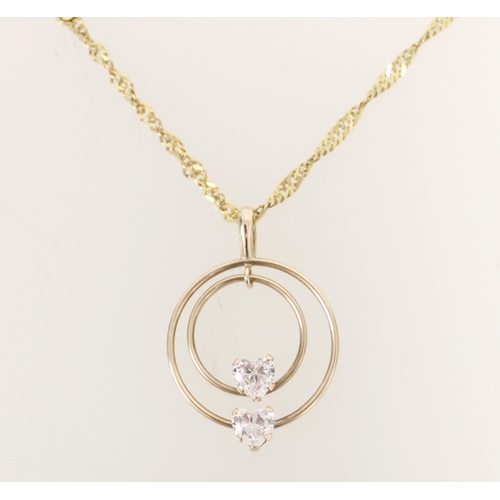 421 - 9ct gold and white stone pendant on fine 9ct gold chain, 2.0g.