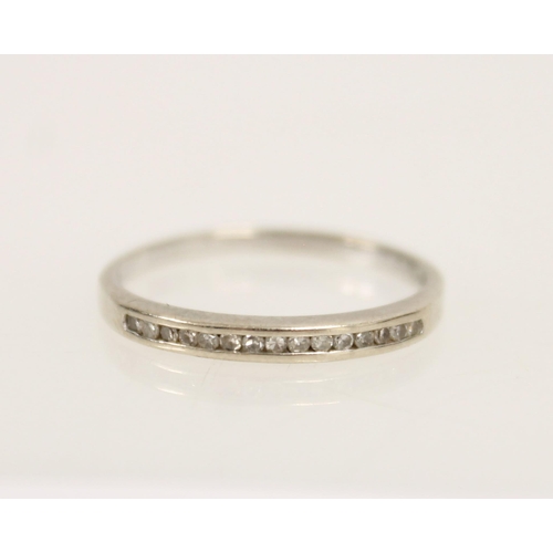 424 - 9ct white gold and diamond half eternity ring, 1.8g.