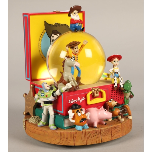 242 - Toy Story & Winnie the Pooh musical snowglobes