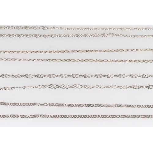 438 - Four silver necklaces, 128g.