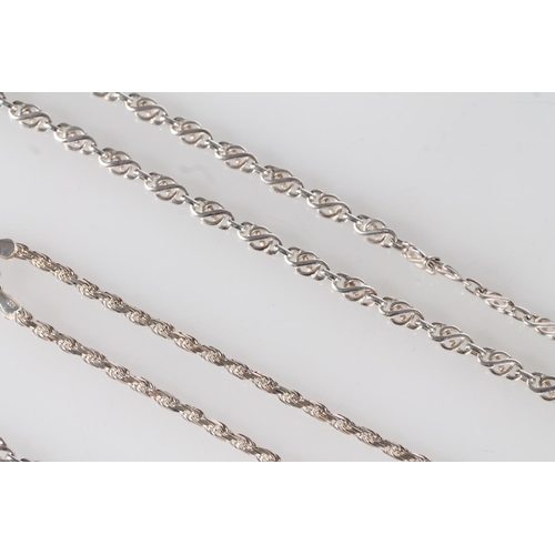 438 - Four silver necklaces, 128g.