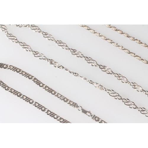 438 - Four silver necklaces, 128g.