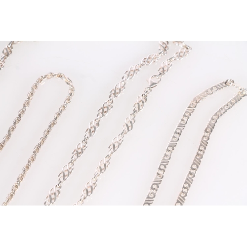 438 - Four silver necklaces, 128g.