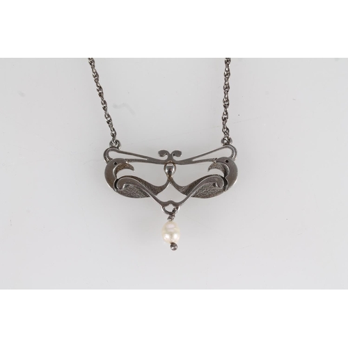 441 - Ola Marie Gorie silver stylized bird and suspended pearl pendant on silver chain.