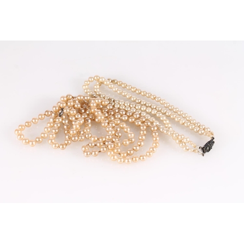 453 - Two simulated pearl necklaces