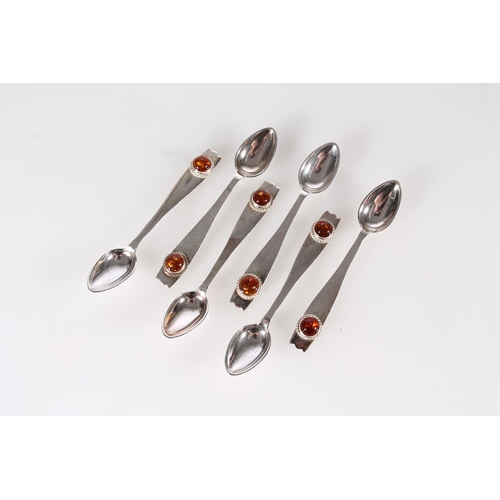 488A - Set of six hallmarked silver teaspoons with cabochon amber terminals, 70g.