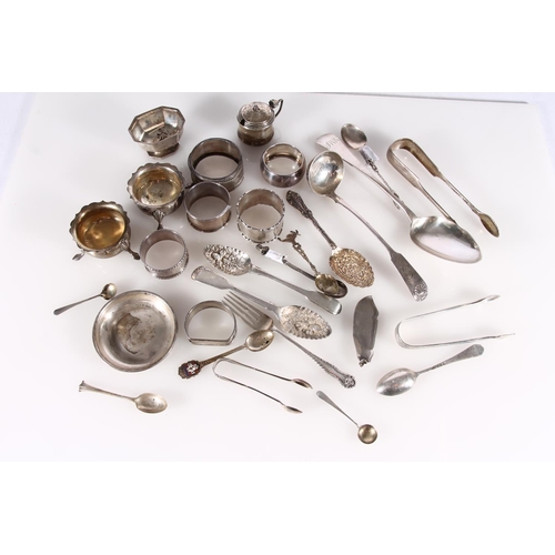 489A - Selection of hallmarked silver incl. spoons, napkin rings, salt pots etc. gross 576g.