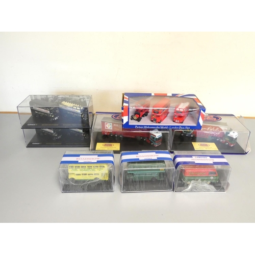 134 - Oxford Diecast. A group of 1:76 scale boxed models behind plexiglass cases to include 