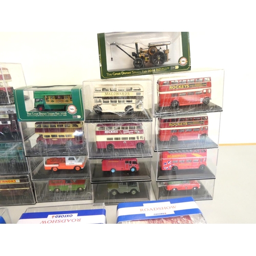 135 - A group of 1:76 scale models behind plexiglass cases comprising of issues by Oxford, Corgi etc. To i... 