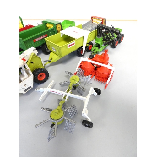 143 - Siku. Box of die-cast model tractors and farm implements to include a Claas Jaguar 695 3854, a  Claa... 