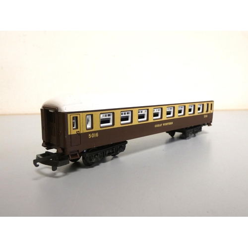 219 - Box of 00 gauge rolling stock carriages to include several Lima GWR Coaches, a Hornby LNER Sleeping ... 