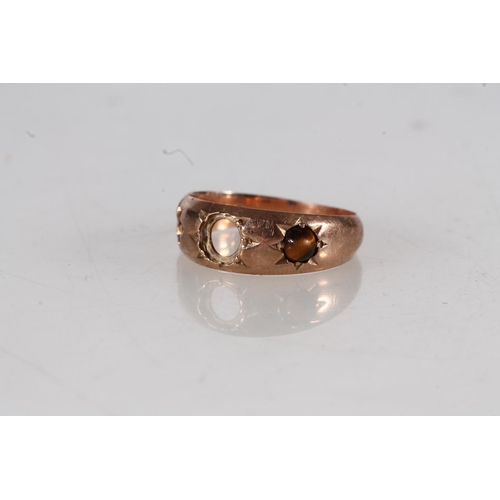 503 - 9ct gold ring set with cabochon tigers eye stone, size M, 2.3g.