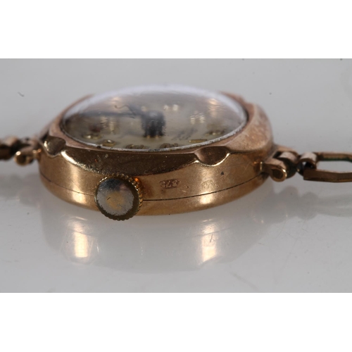 512 - Ladies 9ct gold cased Lanco wristwatch with 17 jewel movement, on rolled gold bracelet, 13g gross.