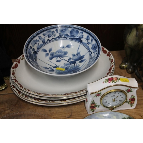 105 - Decorative ceramics to include a Royal Albert Old Country Roses mantel clock, an antique moulded gla... 