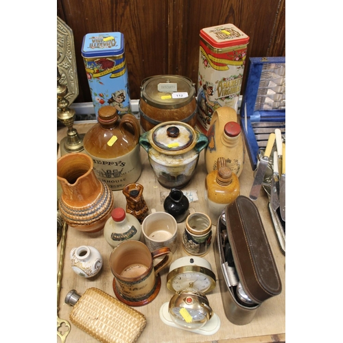 112 - Coopered oak biscuit barrel, two Italian tins, stoneware whisky bottles, a Doulton Lambeth Disdain M... 