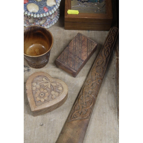 115 - Treen letter opener with carved Celtic style knotwork handle, a Scandinavian kovsh type tankard, an ... 