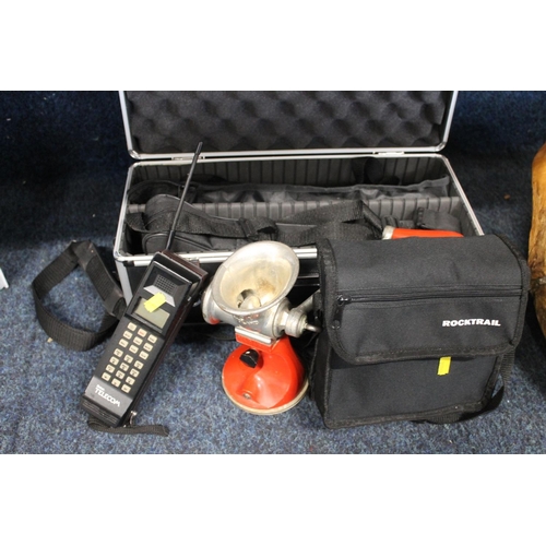 120 - Vintage British Telecom mobile phone, a rock trail, a cased set of binoculars, a mincer, etc.