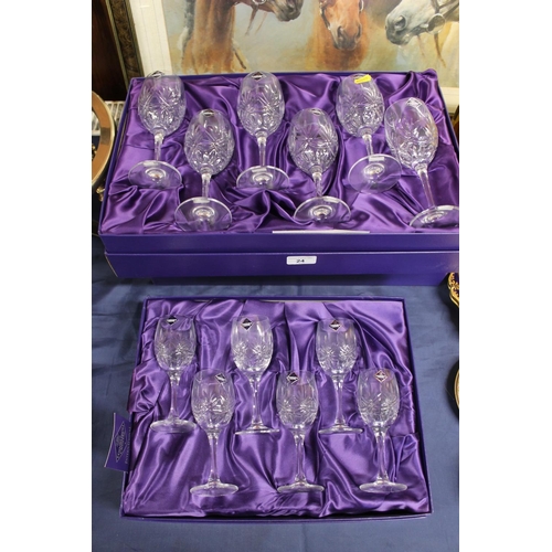 24 - Three boxes containing Edinburgh Crystal International wine glasses and port glasses.