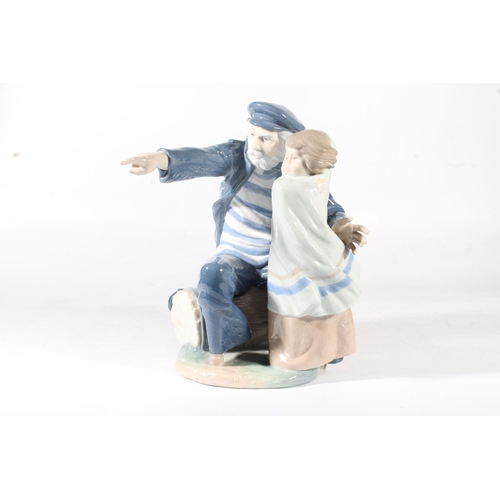 27 - Nao porcelain figurine of a sailor with young child, a/f