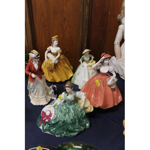 34 - Five Royal Doulton, Coalport and Royal Worcester porcelain lady figurines.