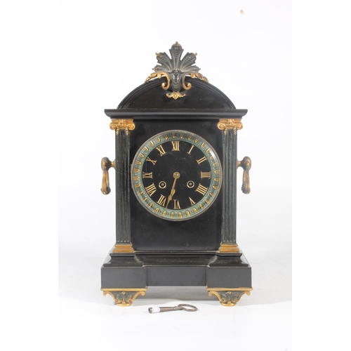 4 - Black slate and gilt painted mantel clock of classical design, 38cm high.