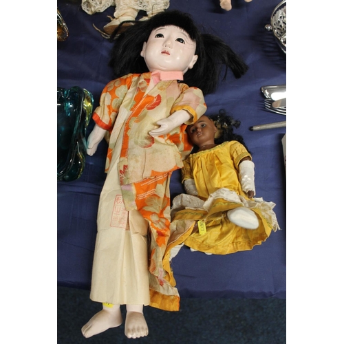 42 - Early 20th century black bisque headed doll model 277 and a Chinese doll.