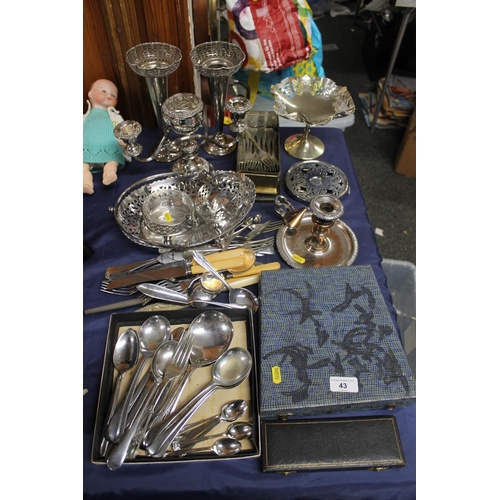 43 - Silver-plated vases, chambersticks, cutlery, etc.